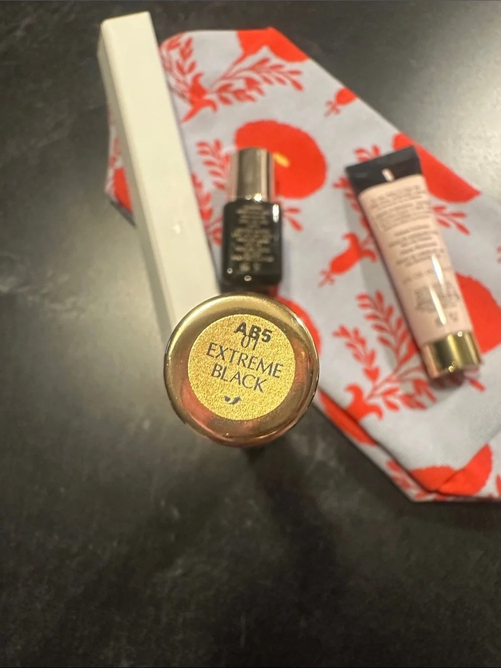 Estee Lauder gold, black, and cream skincare trio - Picture 6 of 6